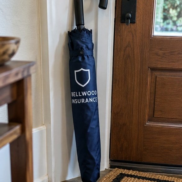 Customer photo of a custom umbrella by a door